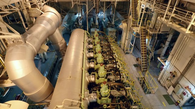 Main engine of very large crude oil carrier tanker in engine room space