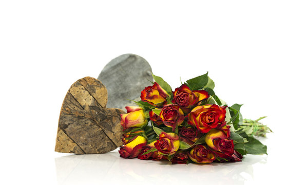 old red and yellow roses and heart shape