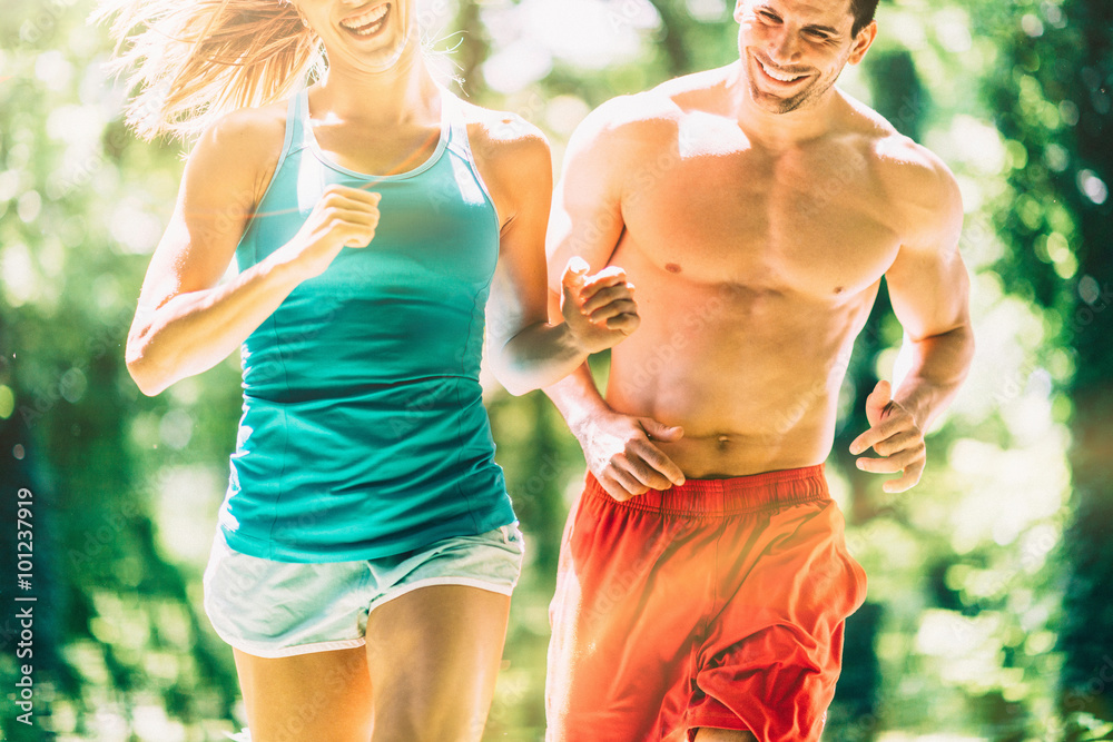 Wall mural Couple jogging