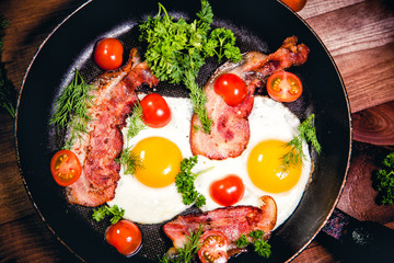 Scrambled eggs with bacon delicious breakfast