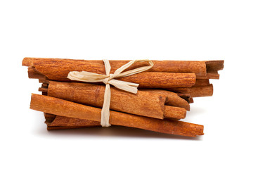 cinnamon sticks isolated on white