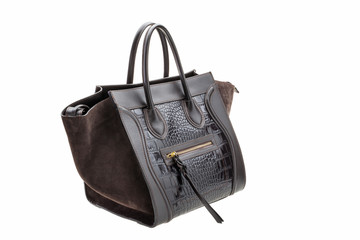 Naklejka premium Dark chocolate leather womens bag isolated on white background.