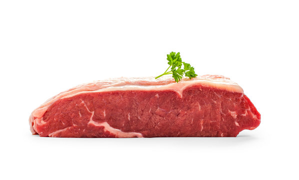 Raw rump steak with parsley twig