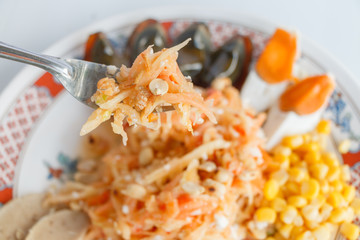 Thai traditional food style papaya salad and eggs corn. SOMTAM