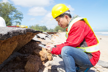 Civil Engineer check Beach Road slide along the beach to water erosion