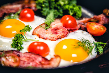 Scrambled eggs with bacon delicious breakfast