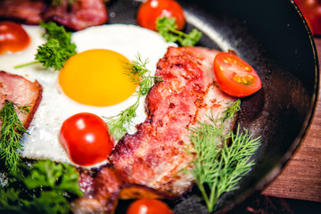 Scrambled eggs with bacon delicious breakfast