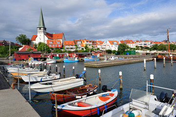 Marina and white church in Ronne, Bornholm, Denmark - obrazy, fototapety, plakaty
