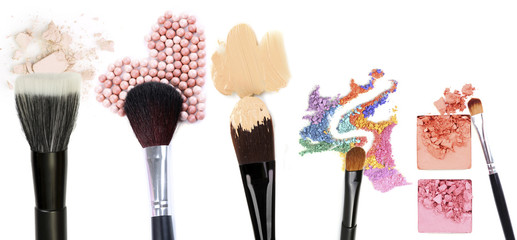 Different makeup brushes isolated on white