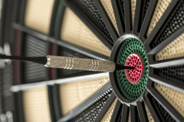 Dart in the red center of a target