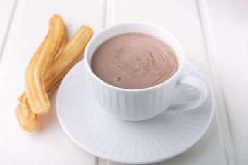churros con chocolate, a typical Spanish sweet snack