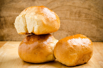 Fresh bun on wooden background,homemade bakery