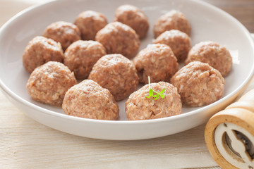 meatballs in ware for roasting, selective focus