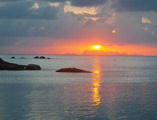 Fototapeta na wymiar Beautiful sunset landscape with sea gangway stones