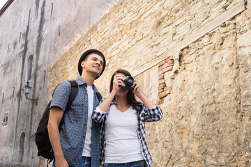 Lovely tourist couple making photos