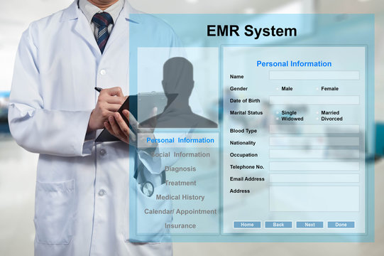 Doctor Working With EMR - Electronic Medical Record System