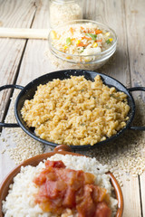 Different rice dishes (paella with vegetables, tomato and rice p