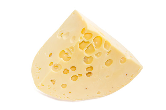 Piece of Swiss-type cheese on a light background