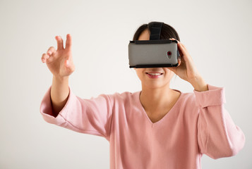 Woman looking though vr device