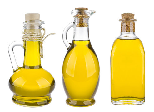 Various olive oil bottles isolated on white background
