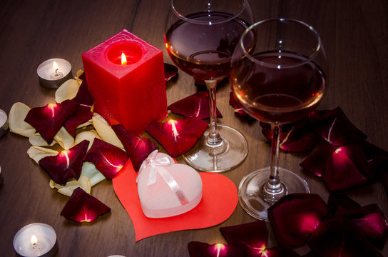 Candles, Red Roses Petals and Wine - Valentines Day Concept