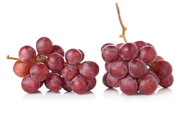 Ripe red grape on white background