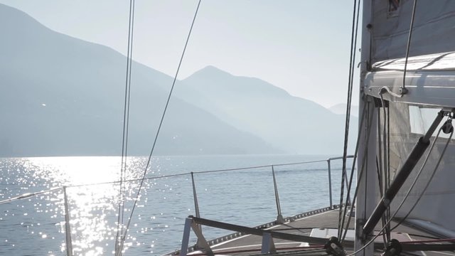 Sailboat sailing in calm lake