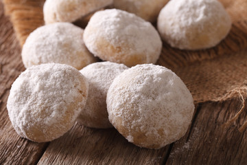 homemade shortbread polvorón macro on a wooden. horizontal
