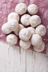 delicious shortbread polvorón closeup. vertical top view
