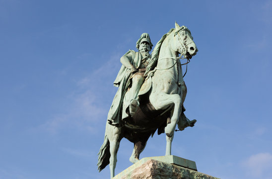 Equestrian statue of the member of Hohenzollern dynasty with beautiful blue sky background in Cologne, Germany