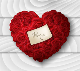 Red rose heart with love message on white wood background