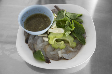 Raw fish sauce shrimp with garlic and spicy chilli / Traditional Thai food