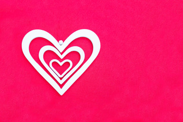 White decorative hearts of different sizes