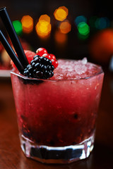 beautiful and tasty berries cocktail or lemonade with a nice bokeh. soft focus.