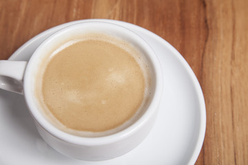 white cup of black coffee