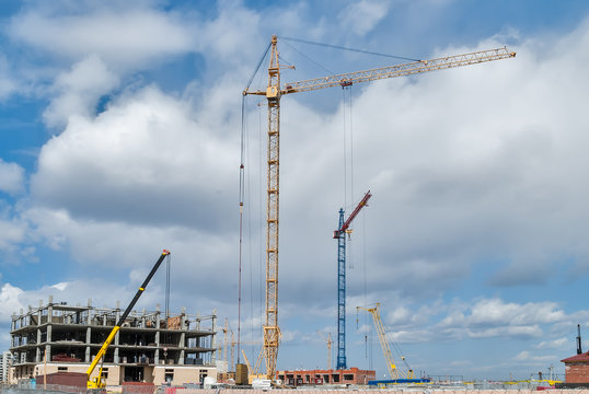 Construction site with crane and building in Tyumen. Russia