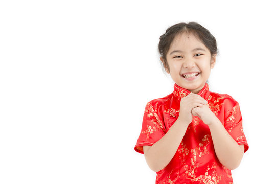 Little Asian girl wishing you a happy Chinese new year on isolated