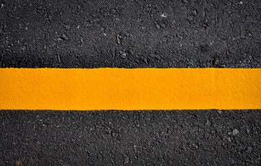 yellow line on asphalt road texture