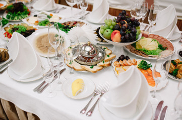 Banquet wedding table setting on evening reception