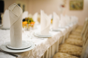 Banquet wedding table setting on evening reception