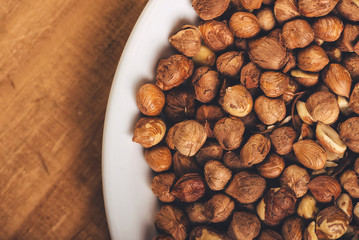 Plenty of ripe hazelnuts on plate