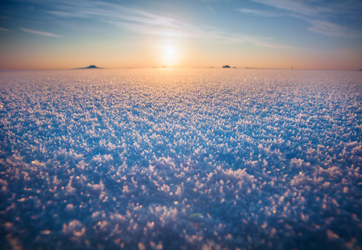 Sunset and snow field