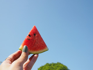 Watermelon with blue sky background