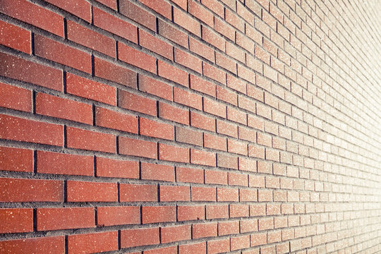 Background with perspective of red brick wall