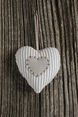 Heart over a wooden background