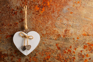 Heart over a rusty metal background with space for text