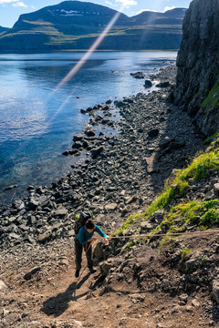 Woman hiking in most the isolated icelandic national park - Hornstrandir.