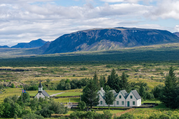 Famous Thingvellir with white church, Iceland.