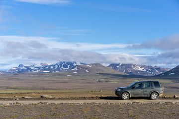 Fototapeta na wymiar Traveling with 4x4 on a F35 highland road through a central part of Iceland to Hveravellir.