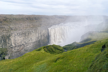 Obraz premium Scenic view of majestic Dettifoss waterfall, North Iceland.